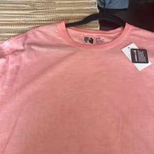 NWT Garment dyed light pink active wear Tee distressed bottom hem size M